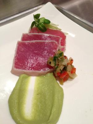 A perfectly seared Yellowfin Tuna appetizer with avocado mousse
