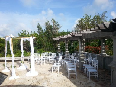 The set up for a beautiful wedding poolside at a villa