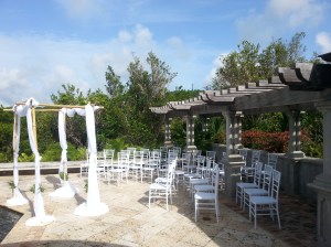 The set up for a beautiful wedding poolside at a villa